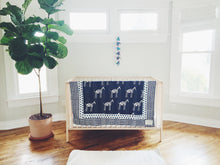 Load image into Gallery viewer, Handmade Embroidered Quilt in Indigo Giraffe - CovetedThings
